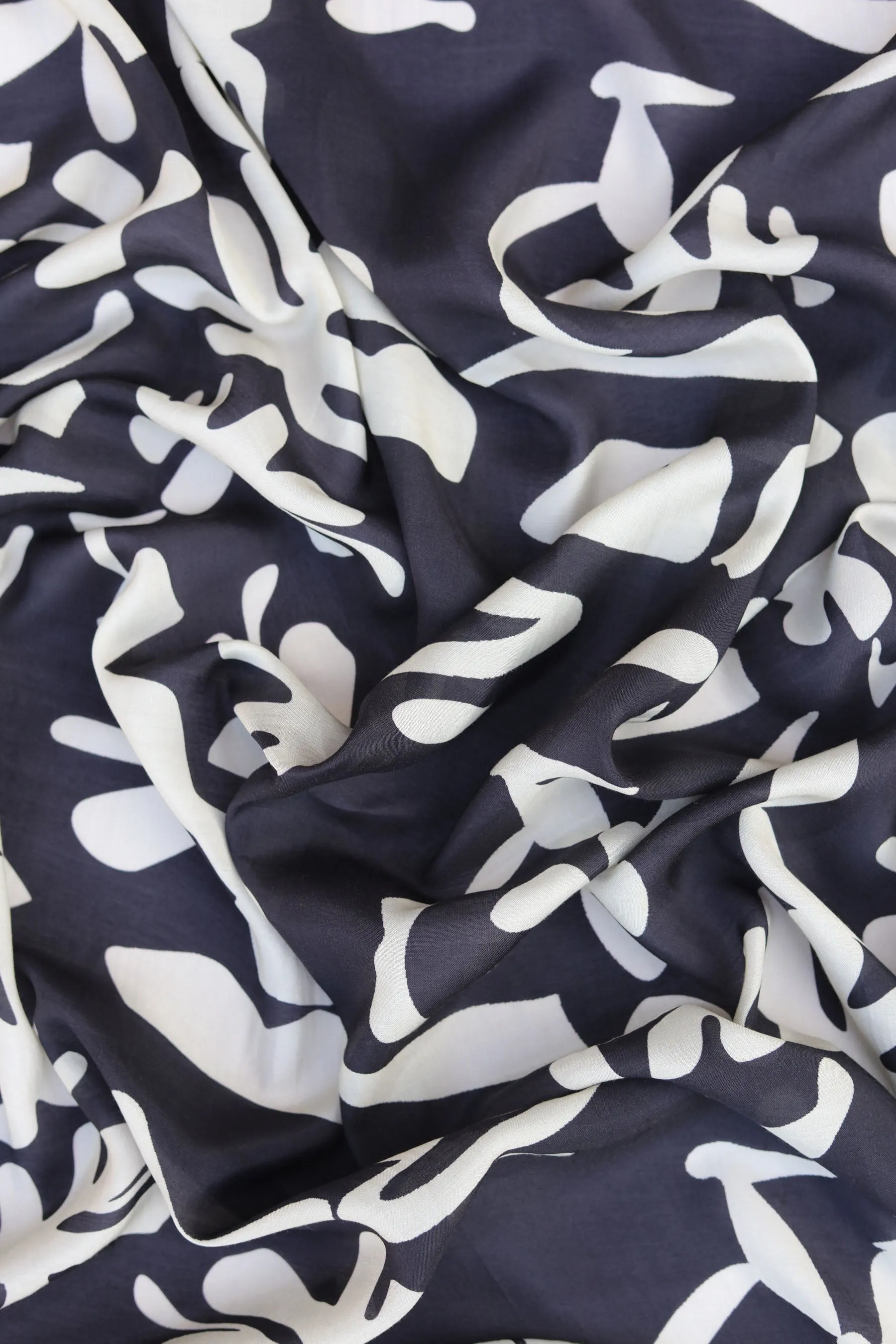 Black and Off White Abstract Pattern Printed Natural Muslin Silk Fabric