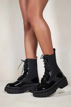 NELLIE CHUNKY ANKLE BOOT WITH KNITTED ELASTIC AND LACE UP IN BLACK PATENT FAUX LEATHER